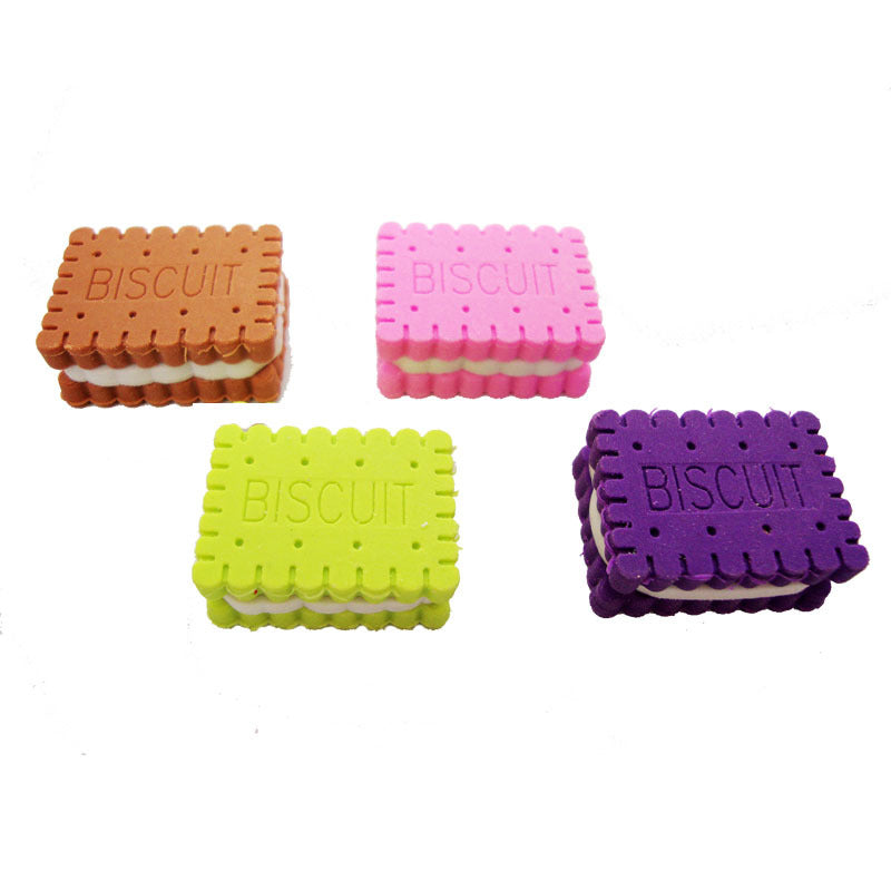 Four biscuit-shaped erasers: brown, pink, neon green, purple; white cream centers and 'BISCUIT' embossed.
