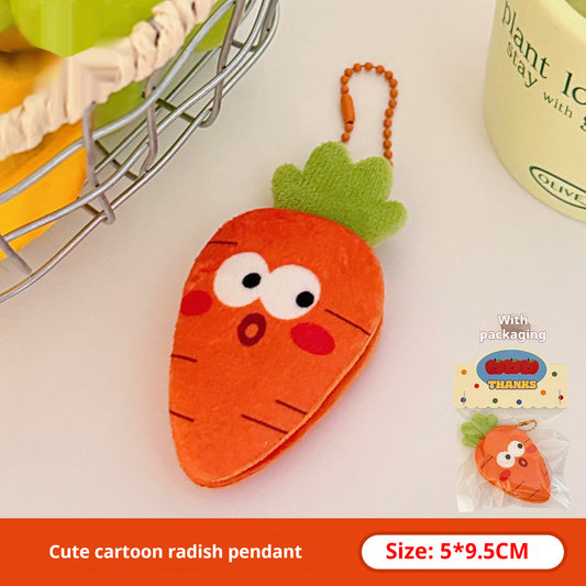 One orange plush carrot keychain with green felt top, white eyes, red cheeks, surprised mouth, orange chain.