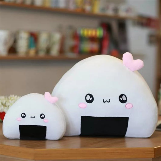 Two white onigiri plush (large and small) with black seaweed patches, kawaii faces and pink hearts.