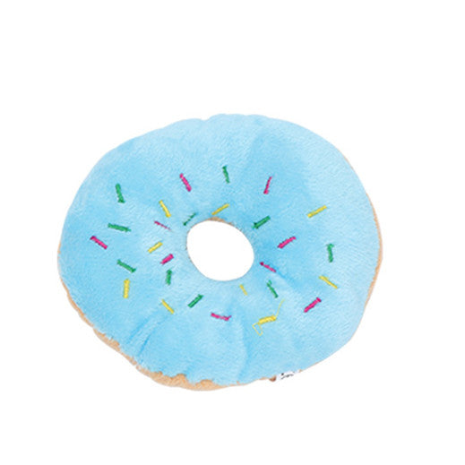 One round donut-shaped plush toy with light blue top, multicolored embroidered sprinkles and tan underside.