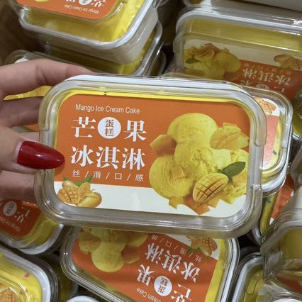 Mango ice cream tub squishy held in a hand