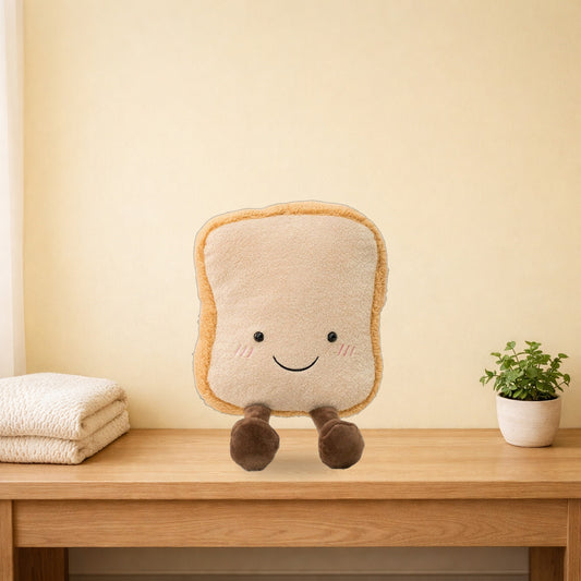 Smiling toast plush sitting on an oak bench in a cosy bedroom