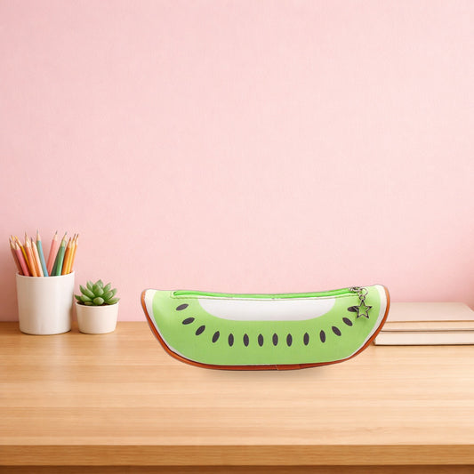 Green kiwi slice pencil case on a light oak study desk