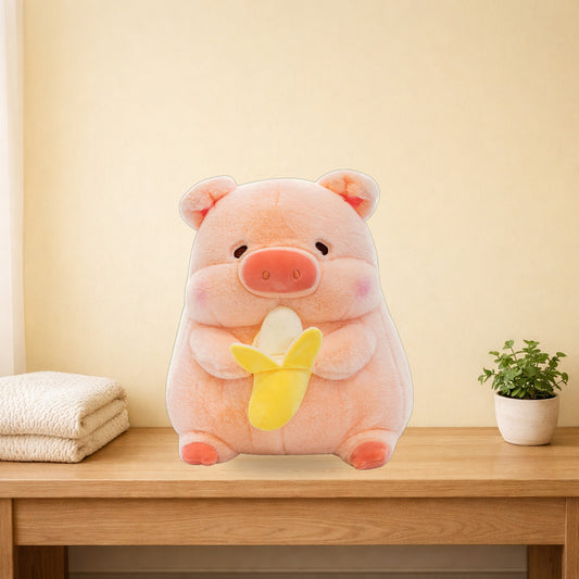 Pink pig plush toy hugging a banana, sitting on a light oak console table