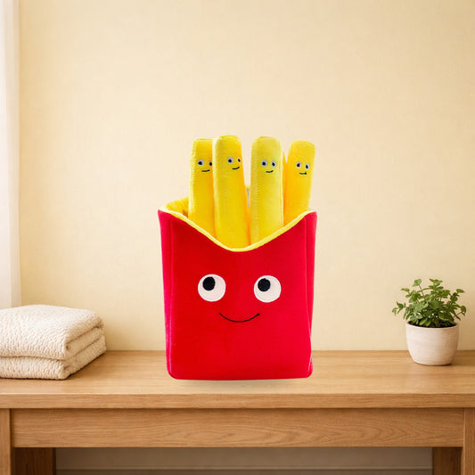 Happy Fries plush pillow on a light oak console table