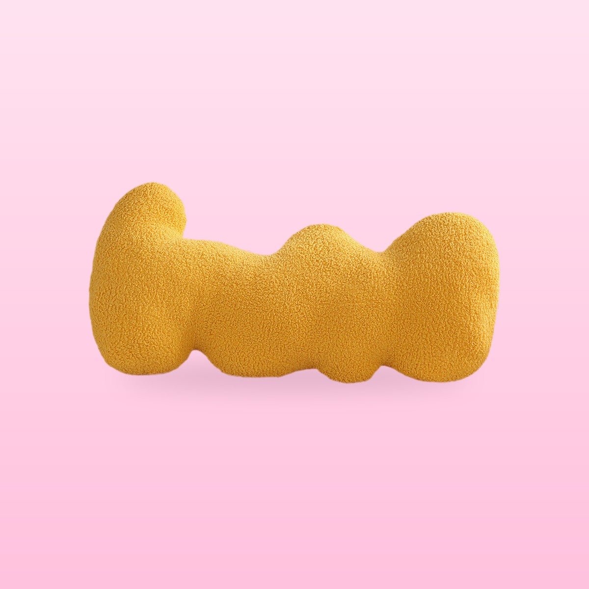 Bee yellow wavy bolster cushion with rounded lobes, on a bubblegum pink background