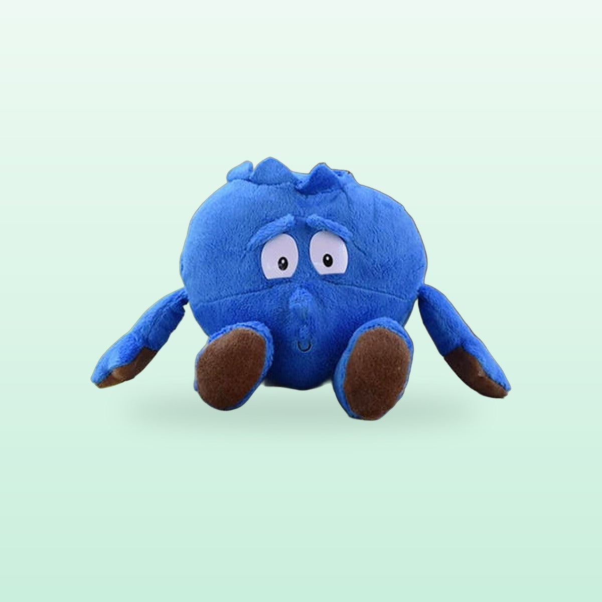 Fruit and veg buddies plush, Blueberry, sitting on a mint green background