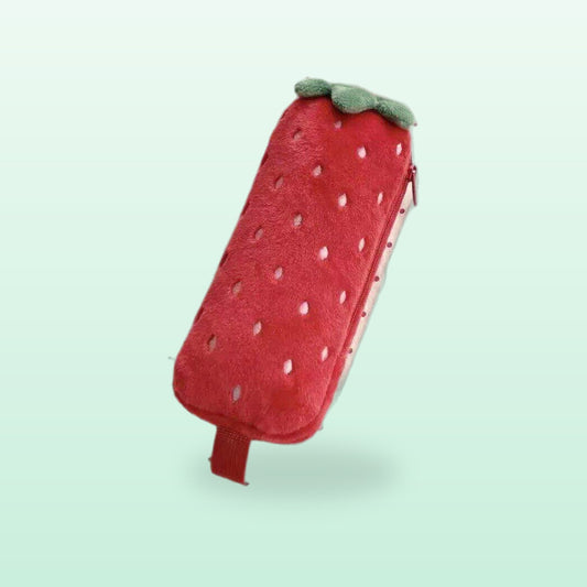 Red strawberry plush pencil case with a green top and an elastic strap, on a mint background