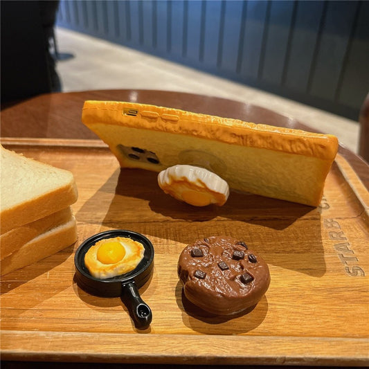 3D toast bread silicone iPhone case with an optional fried egg, cookie or frying pan grip