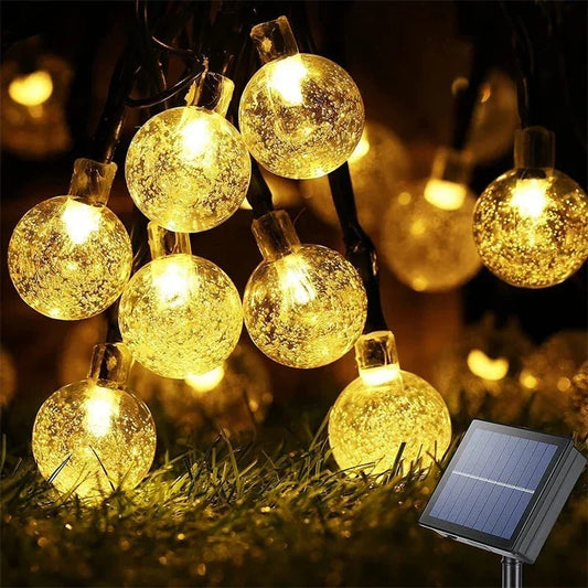 Creating a Magical Outdoor Space with Crystal Globe Solar Lights - Scribble Snacks