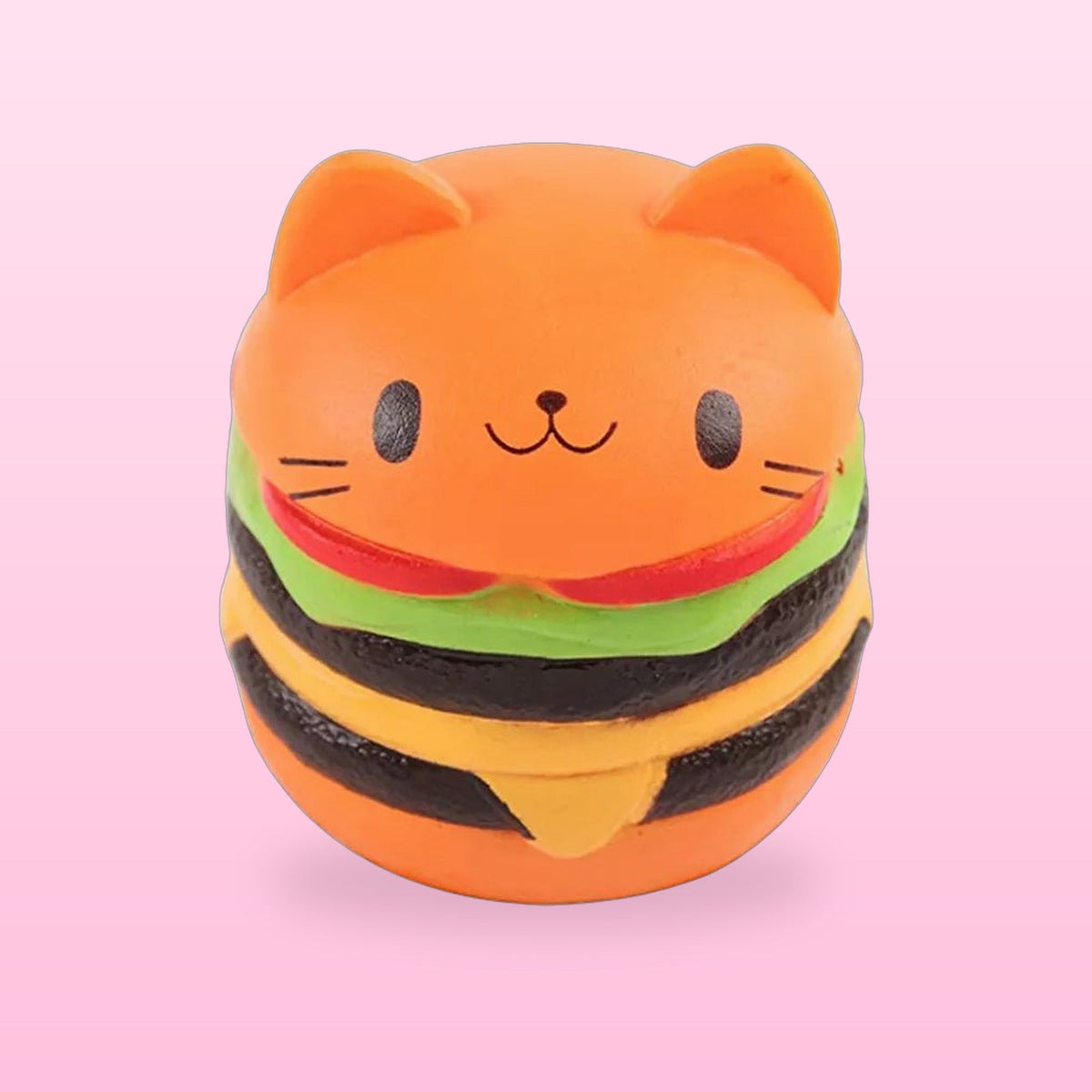 Orange cat face burger squishy stress toy, on a bubblegum pink background