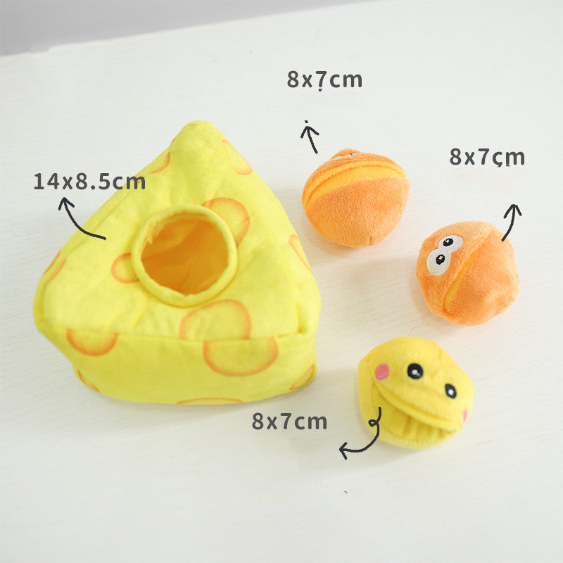 Yellow triangular plush hideaway with round opening and three small plush balls: two orange, one yellow.