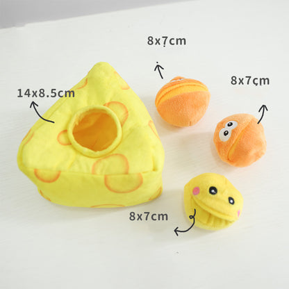 Yellow triangular plush hideaway with round opening and three small plush balls: two orange, one yellow.