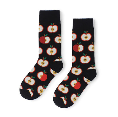 Pair of black crew socks with a repeating red and white apple pattern