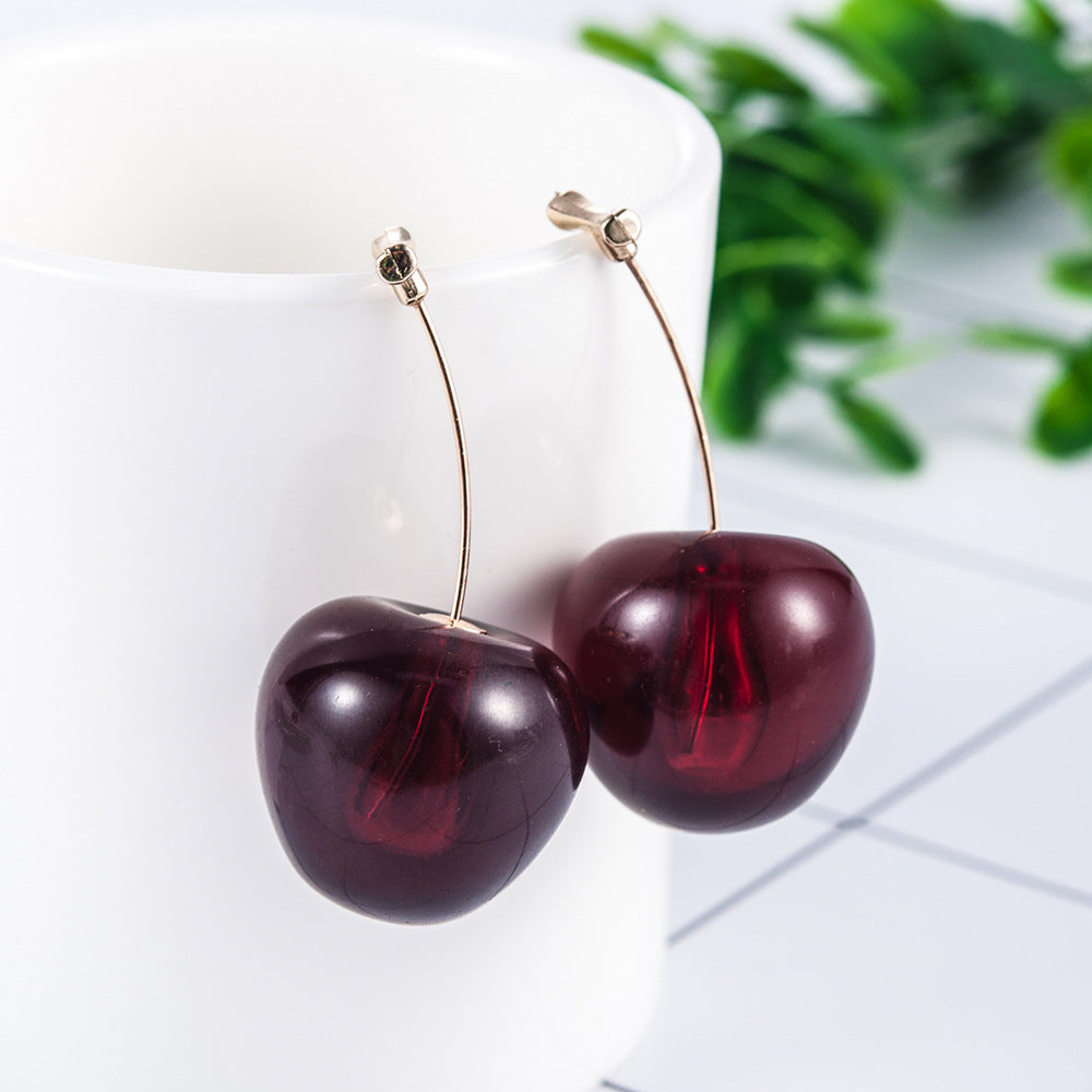 Red cherry fruit stud earrings with a glossy finish, featuring a sleek gold-tone post.