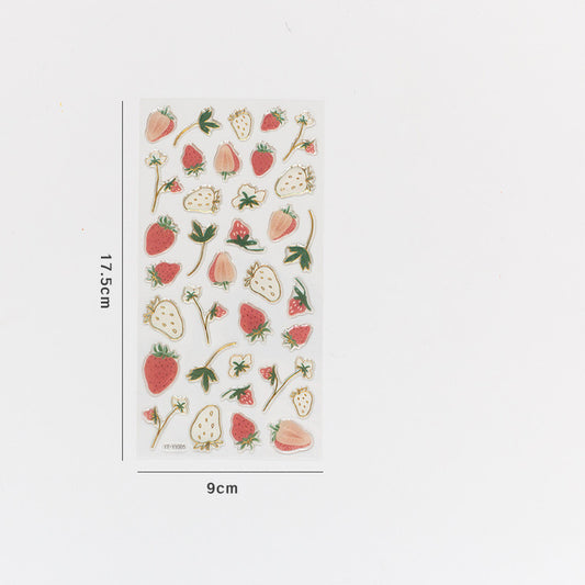 One 17.5×9 cm sticker sheet of red, pale pink and white strawberry and flower stickers with gold outlines.