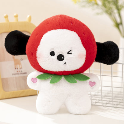 One white plush toy with a red round hood, black ears, winking face, green leaf collar and pink heart patch...