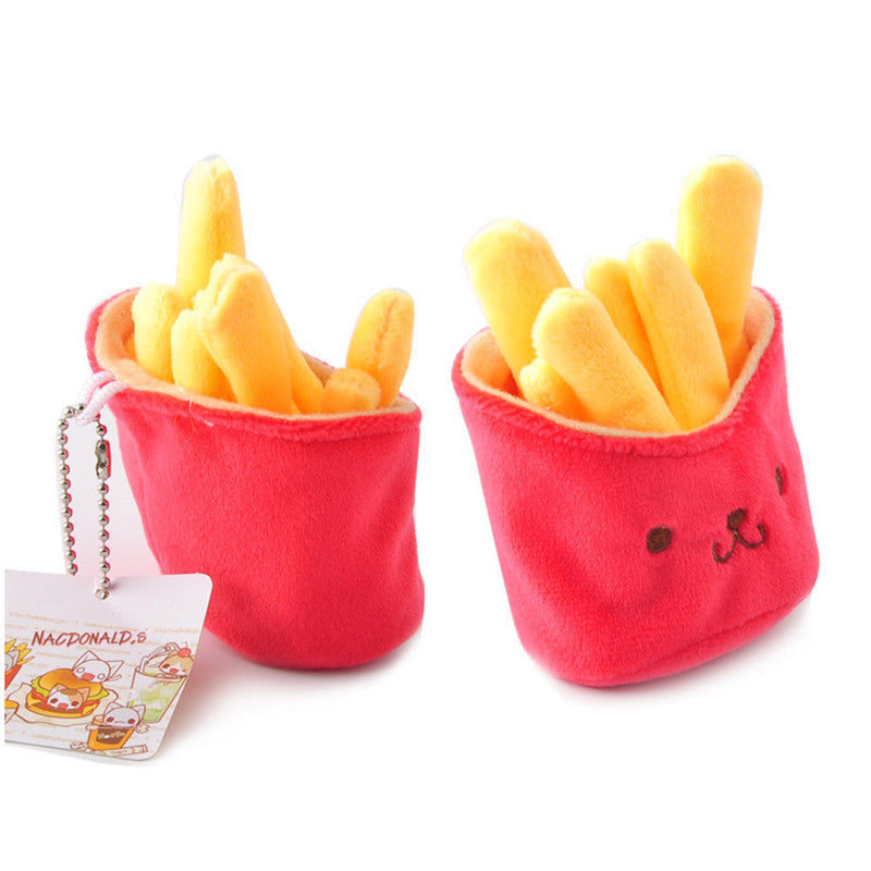 Two red plush french-fry pouches with yellow plush fries; left has ball-chain tag, right has embroidered face.