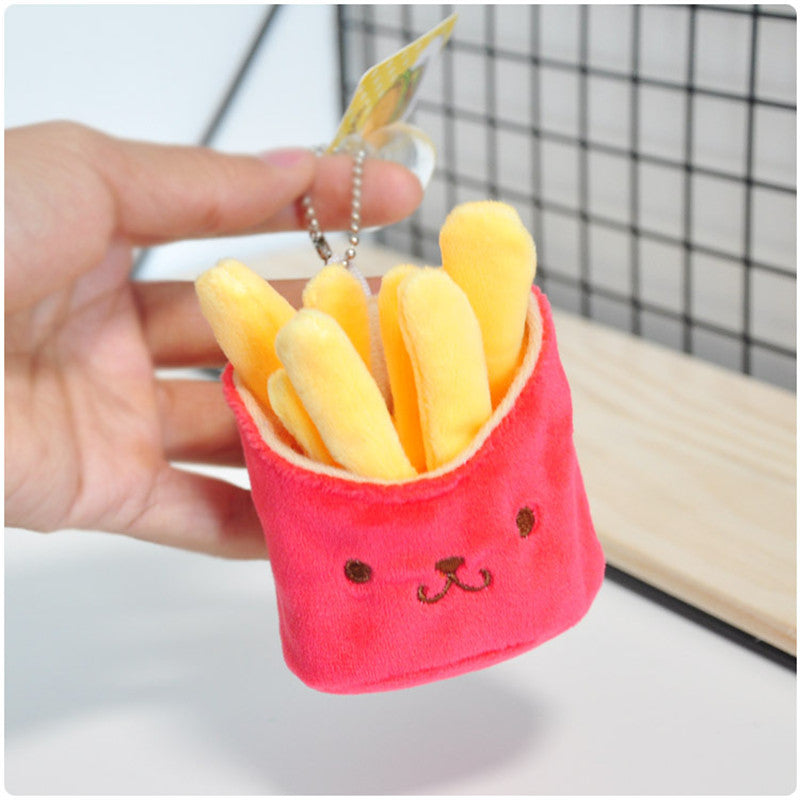 One small plush fries keychain: pink-red carton with embroidered face, yellow plush fries, silver ball chain.