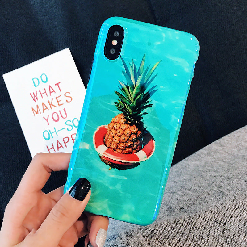 Turquoise iPhone case with camera cutout featuring a pineapple in a red-and-white lifebuoy, held by hand.