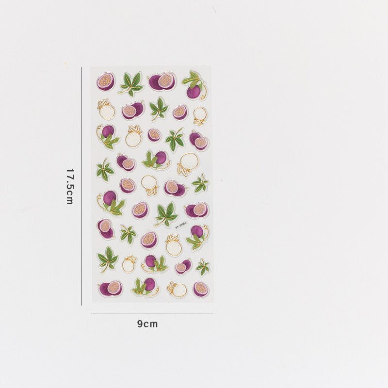 One 9cm x 17.5cm sticker sheet with multiple small purple and green fruit stickers with gold outlines.