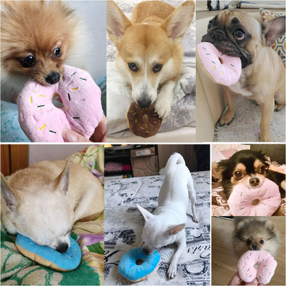Eight small dogs each holding or chewing plush donut toys in pink, blue, and brown in a photo collage.