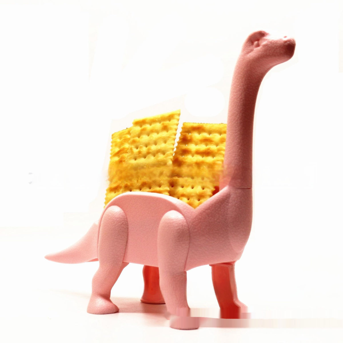 Pink dinosaur taco holder side view