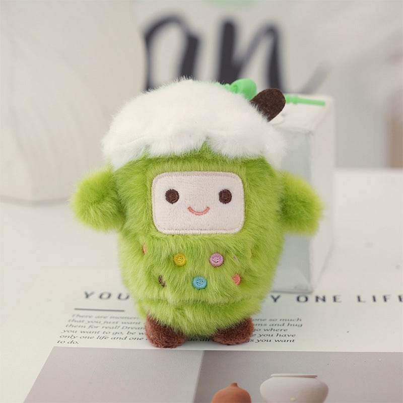 Matcha bubble tea cup plush keychain, green and fluffy with a smiley face and white cream top