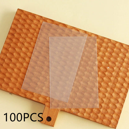 Clear gift bags for Christmas biscuits, showcasing a smooth design, ideal for festive treats and small presents.