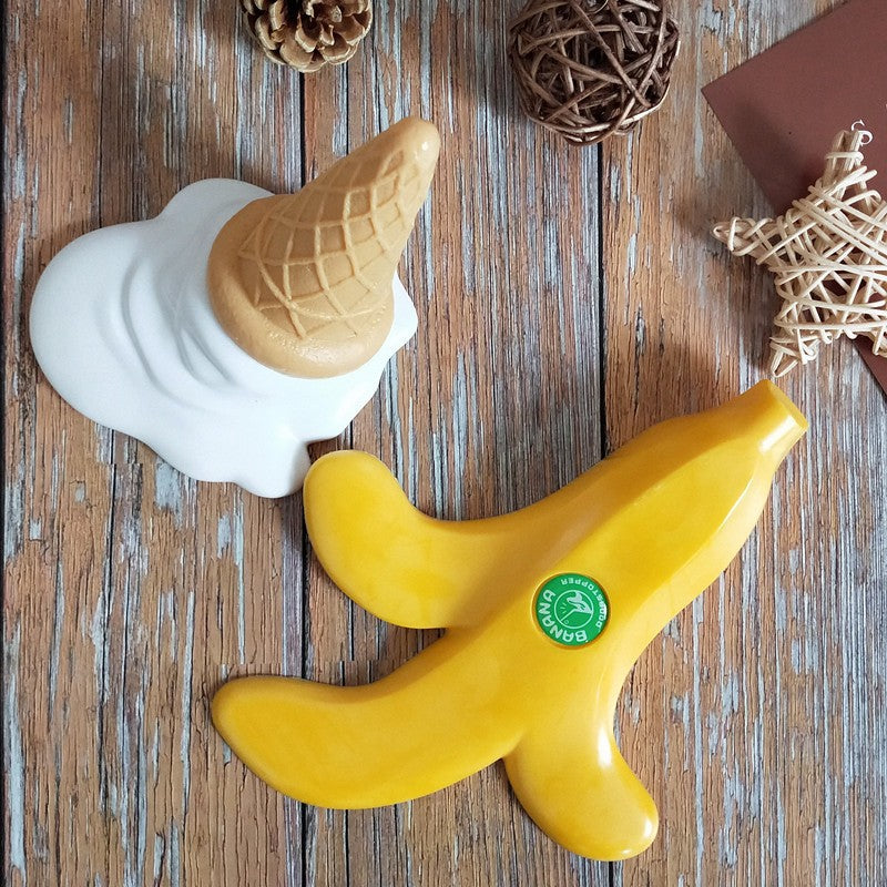 Melting ice cream cone and banana peel door stoppers