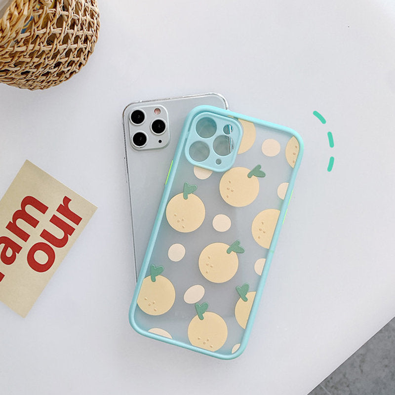 Transparent iPhone case with a pastel blue rim, featuring a playful pattern of yellow oranges on a grey background.