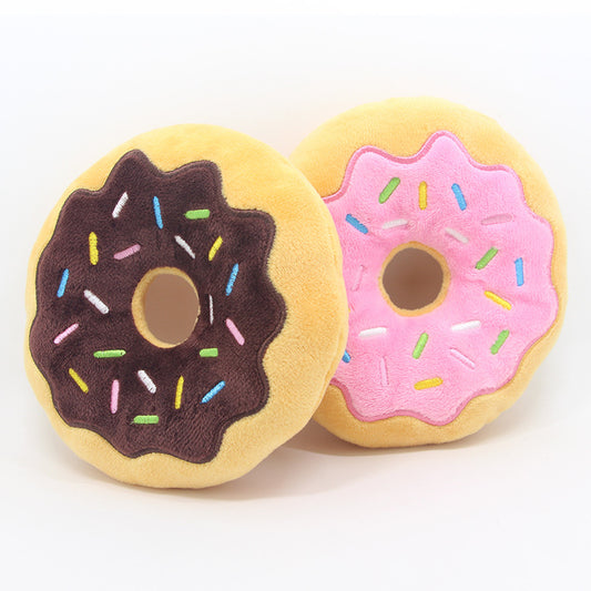 Brown and pink donut-shaped plush toys with a round centre hole, decorated with colourful sprinkles, 20cm diameter.