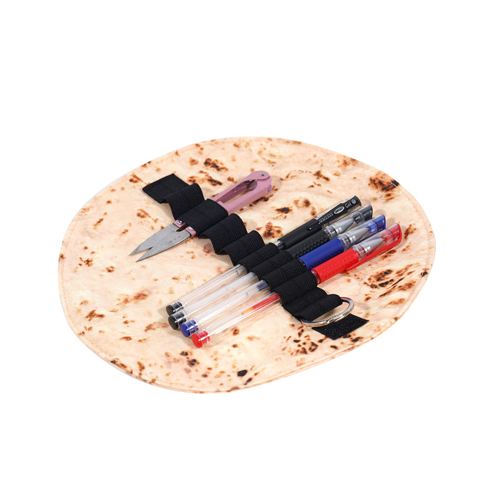 Burrito pencil case holding gel pens and snips