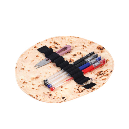 Burrito pencil case holding gel pens and snips