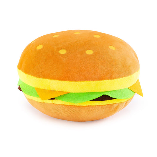 One round plush hamburger pillow with tan bun, yellow cheese, green lettuce and brown patty on white.