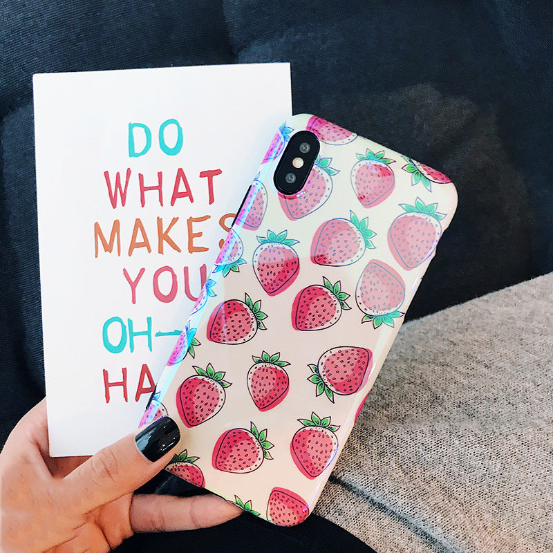 One white phone case with pink strawberry print and a top-left dual-camera cutout, held in hand.