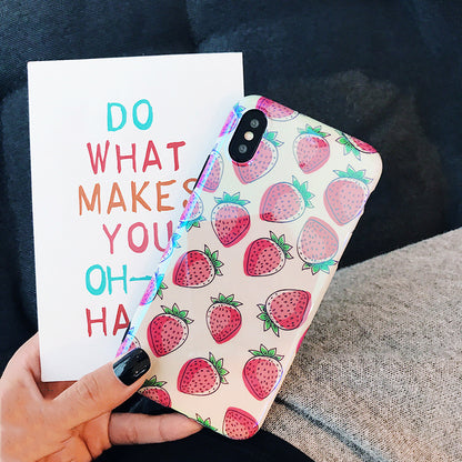 One white phone case with pink strawberry print and a top-left dual-camera cutout, held in hand.