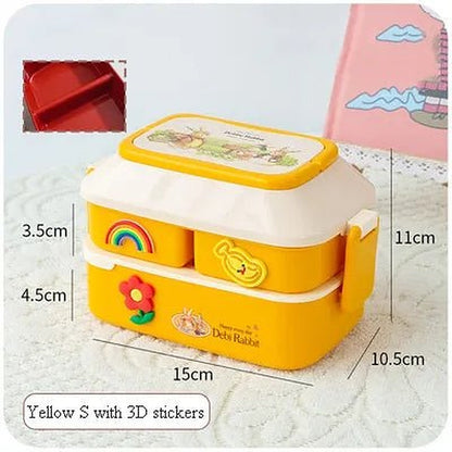 Yellow two-tier bento box with rainbow and flower stickers, small