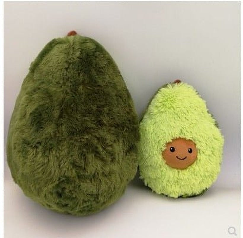 Dark green and light green avocado plush pillows side by side