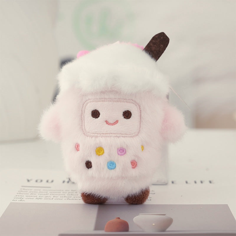 Strawberry bubble tea cup plush keychain, pale pink and fluffy with a smiley face