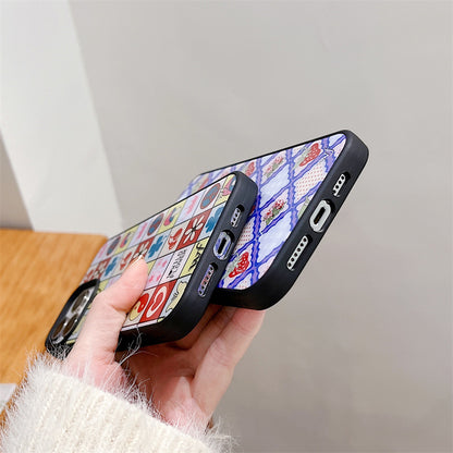 Cherry Blossom Fruit iPhone case featuring a vibrant floral pattern, shown alongside a colourful grid-patterned case.