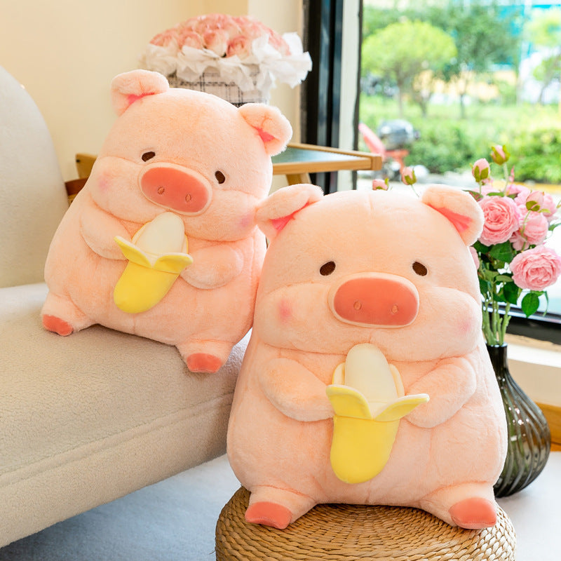 Adorable pink pig plush toys holding yellow bananas, featuring round shapes and soft, cuddly textures.
