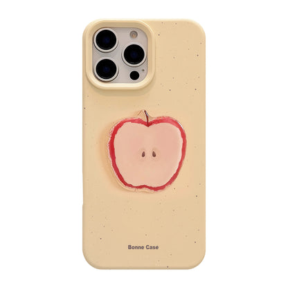 Cute cream silicone iPhone case featuring a raised apple design in pink and red tones. Textured for a playful touch.