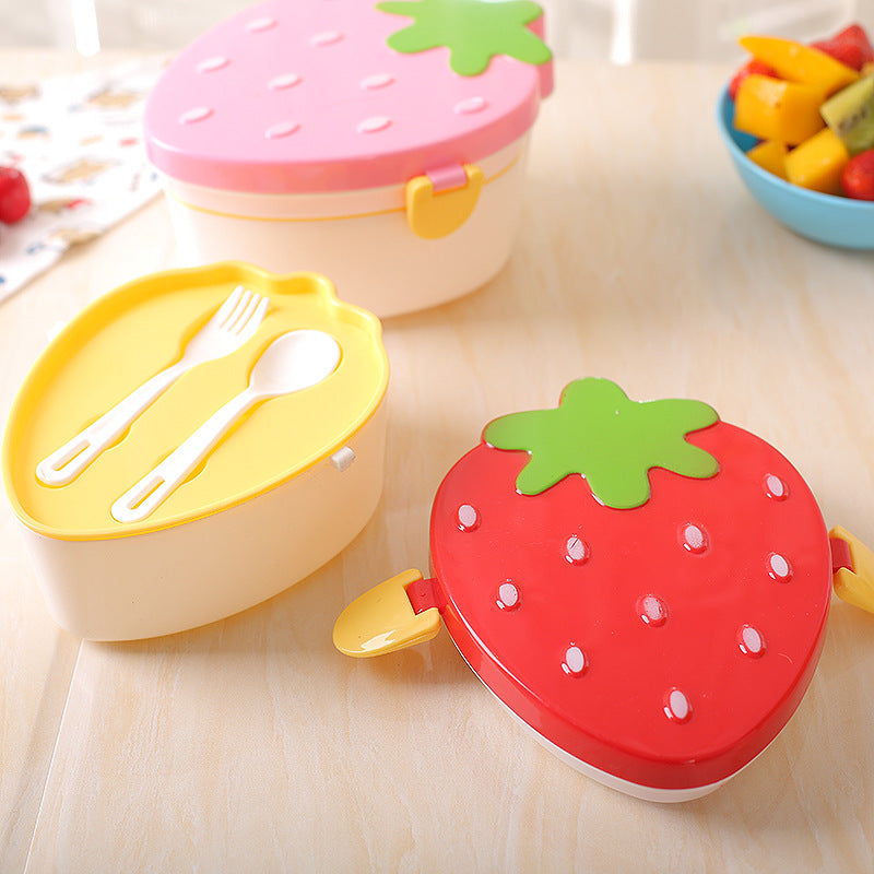Strawberry lunch box with its fork and spoon tray