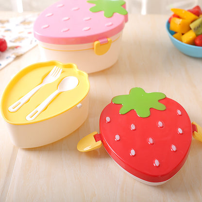 Strawberry lunch box with its fork and spoon tray