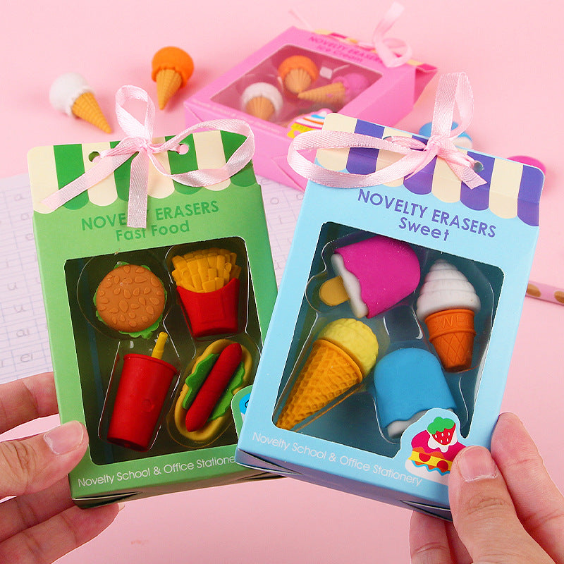 Fast food and sweet eraser boxes held in hand