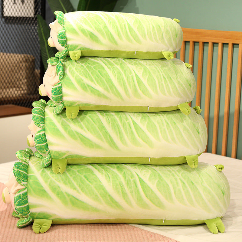 Stack of cabbage pig plush pillows in different sizes