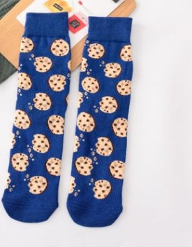 Blue ankle socks adorned with a playful cookie pattern, featuring chocolate chip cookies scattered all over.