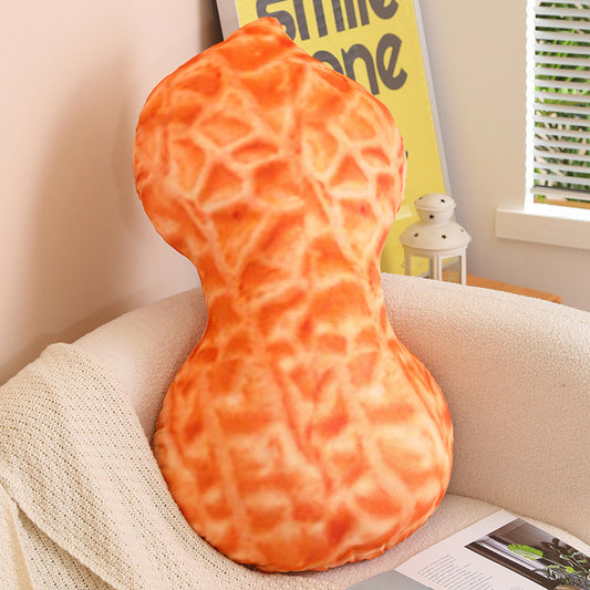 Giant 80 cm peanut pillow on a sofa
