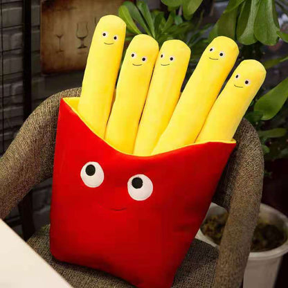 Red plush French-fry container with five long yellow smiling plush fries seated on a gray chair.